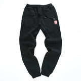 New Men Casual Clothing Plus Size 4XL Winter Fashion Loose Pants Cotton Thick Warm Loose Trousers Man Autumn Elastic Sweatpants